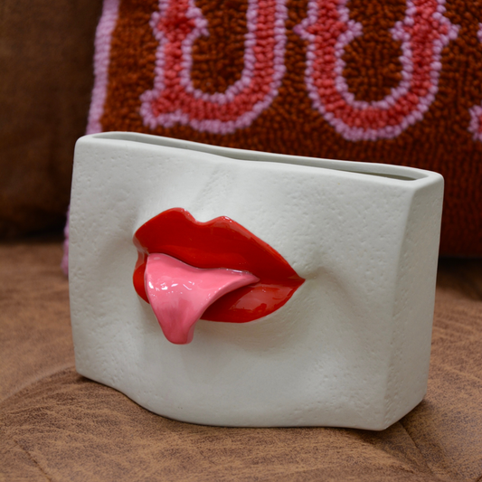 CERAMIC TONGUE-OUT VASE