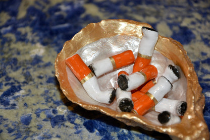 OYSTER SHELL CIGARETTE SCULPTURE