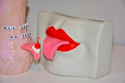 CERAMIC TONGUE OUT VASE